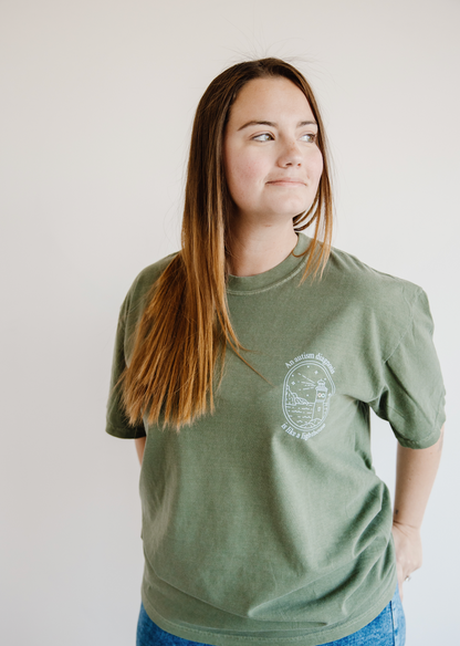 Lighthouse - Adult heavy weight t-shirt green - Inclusive Neuroverse x Kaeli Compton